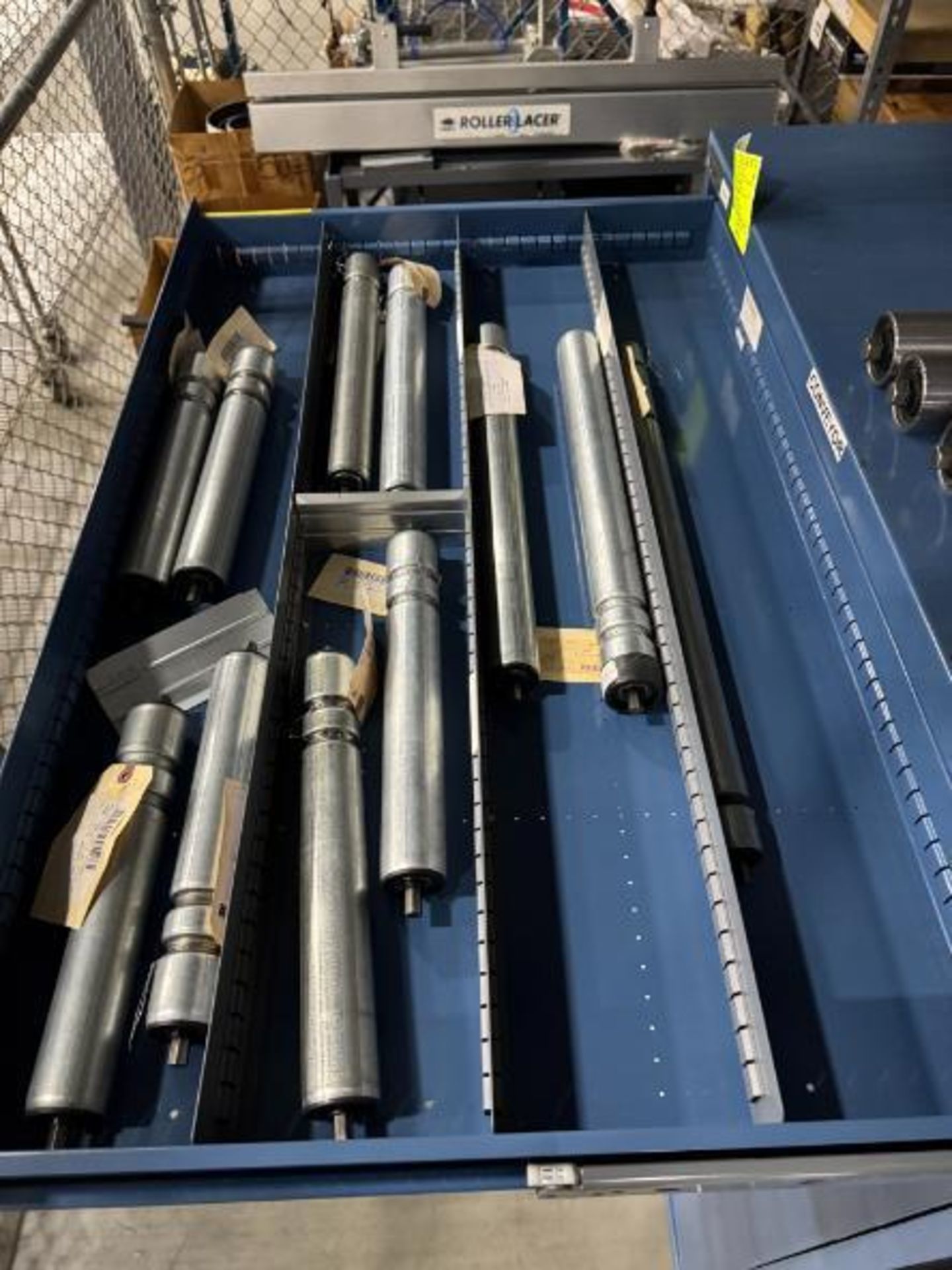 contents of 9) drawers- conveyor idler rollers, drive rollers,