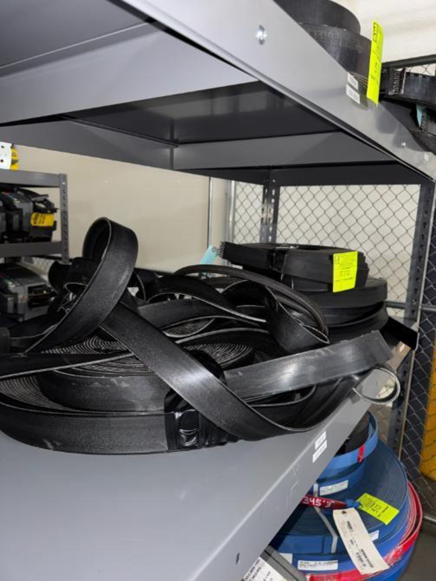 contents of shelf- 2" conveyor belts & rollers