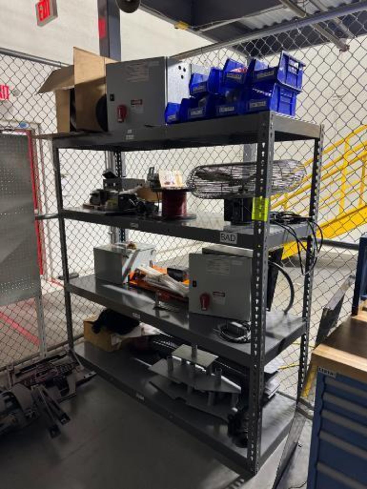 warehouse shelving unit w/ contents