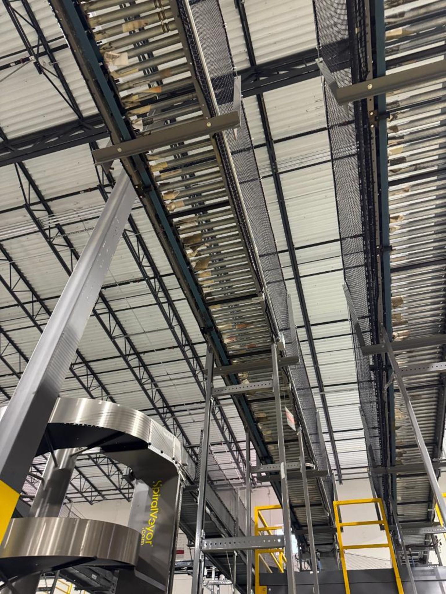 Invata partially powered roller conveyor, on ~16' uprights - Image 2 of 4