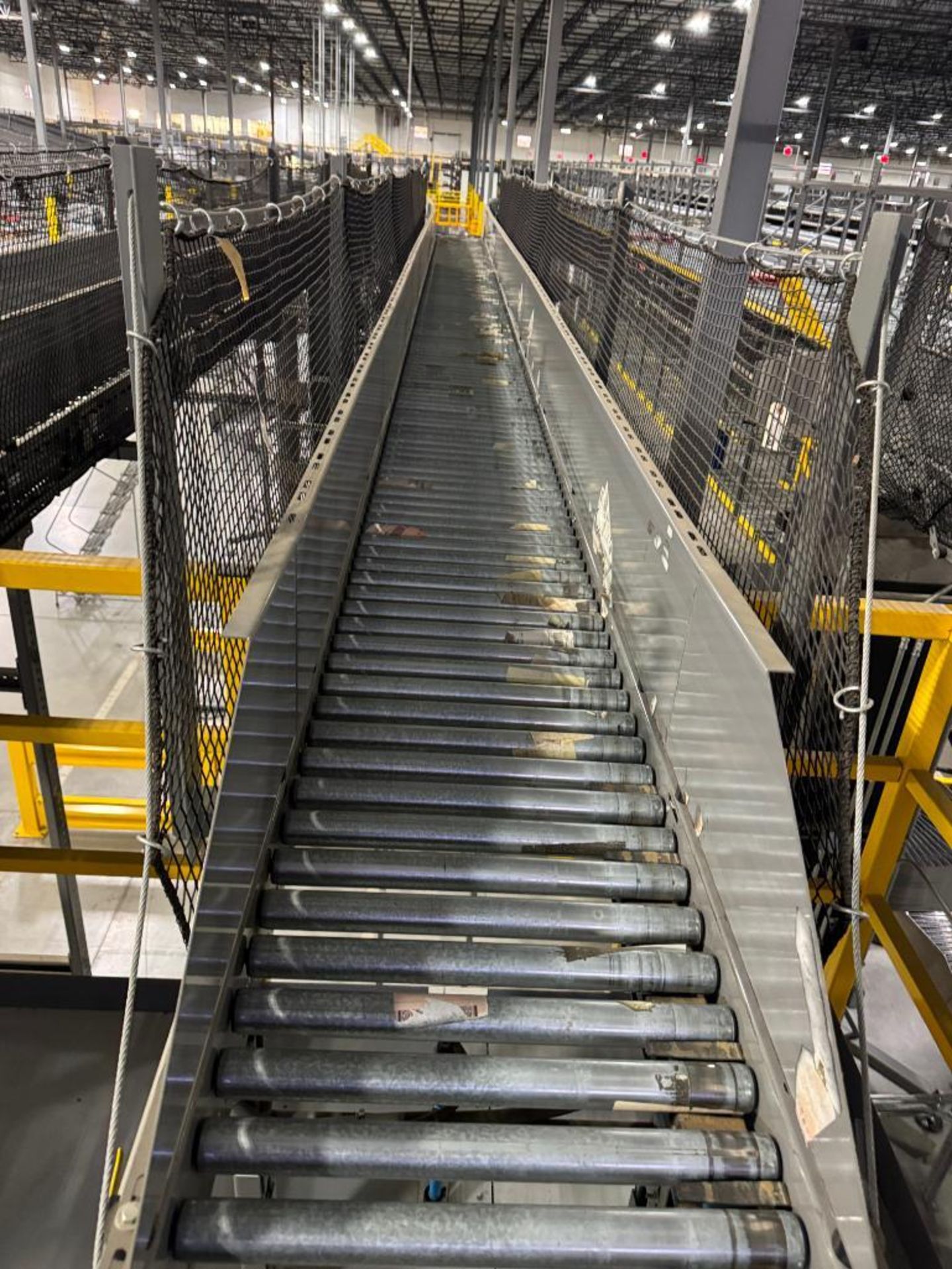 Invata partially powered roller conveyor, on ~16' uprights - Image 4 of 4