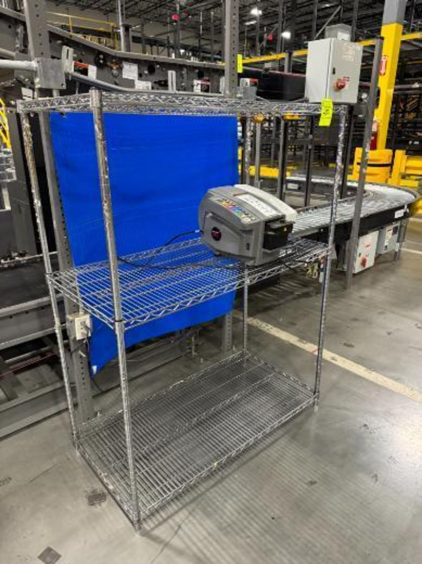 wire shelving unit w/ Better Pack box tape dispenser