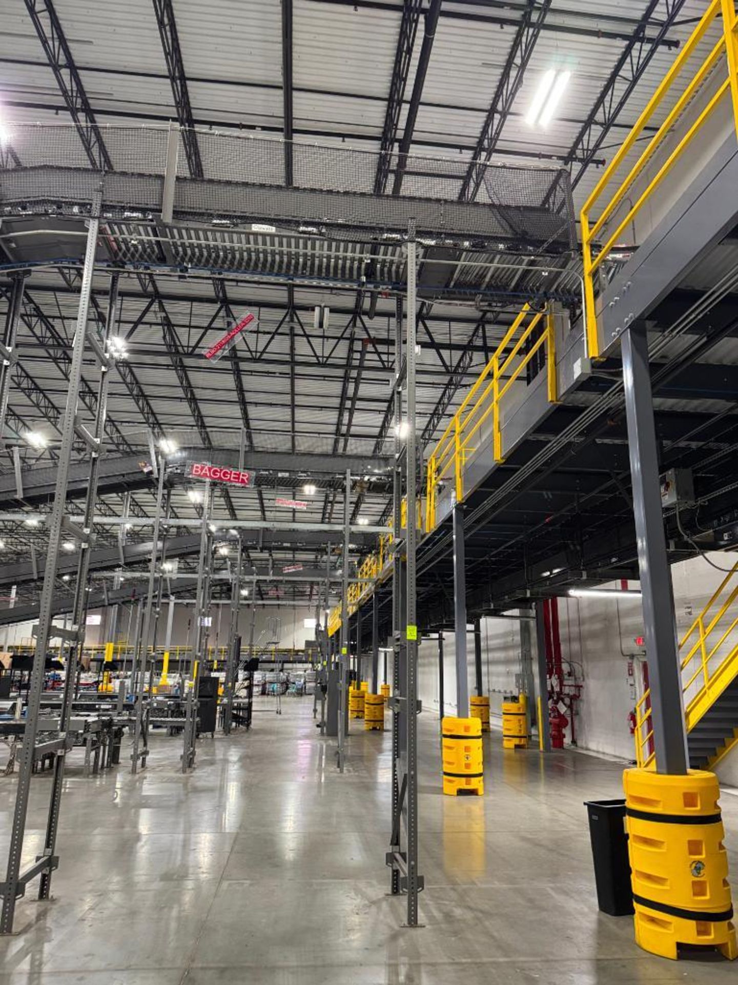 Invata partially powered roller conveyor, on ~16' uprights - Image 2 of 3