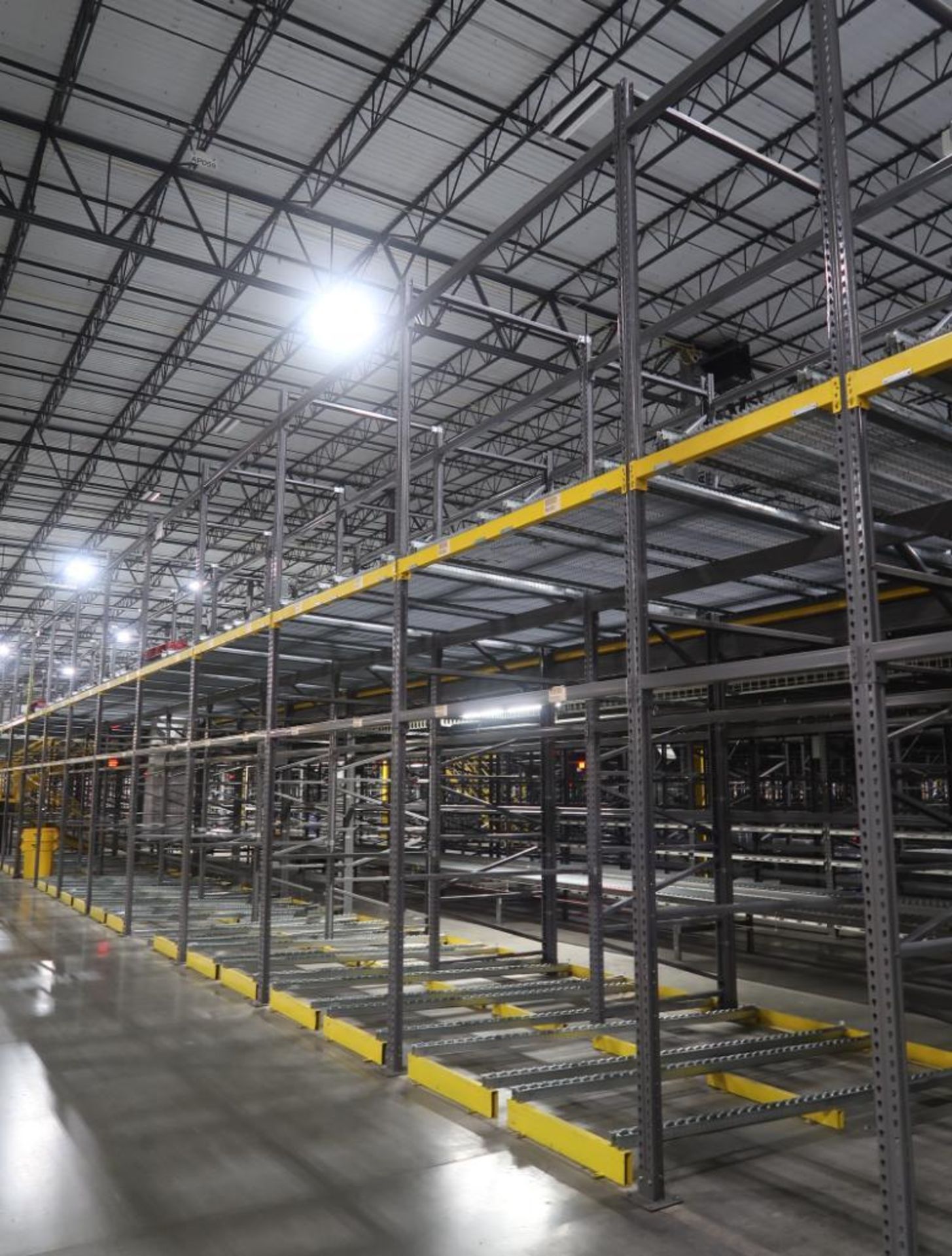 11) sections of pallet racking w/ gravity flow rollers