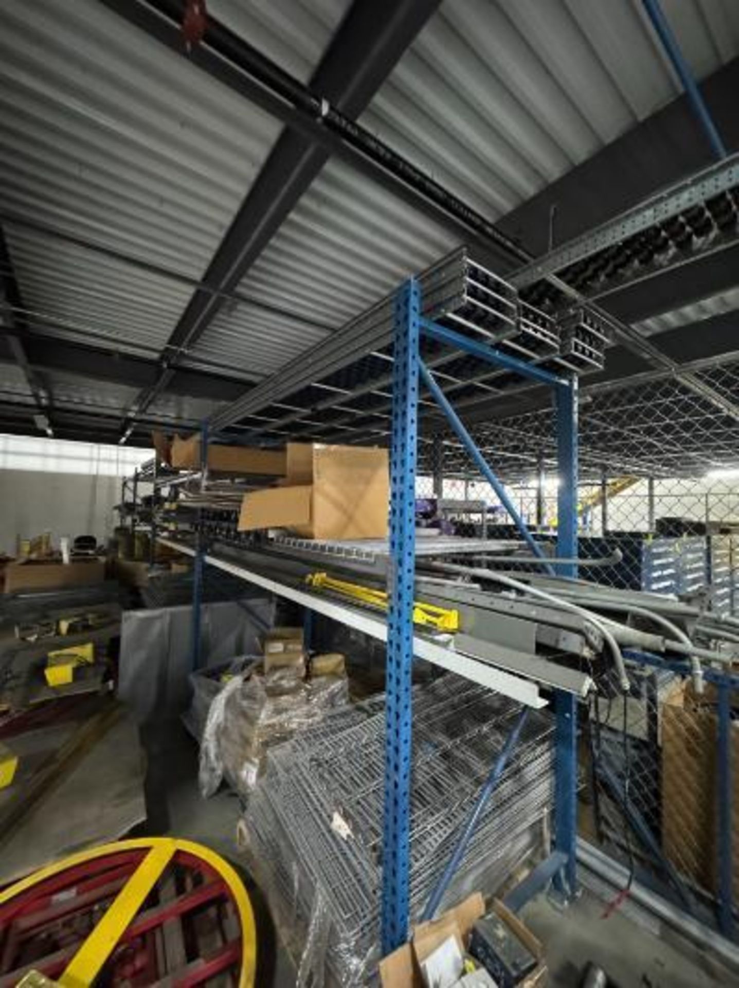 pallet racking, 4) sections, w/ contents- roller conveyor, shoe sorter parts,