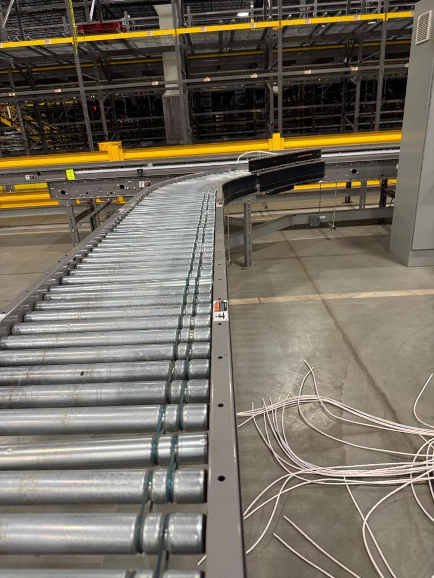 Invata partially powered roller conveyor w/ merger - Image 2 of 4