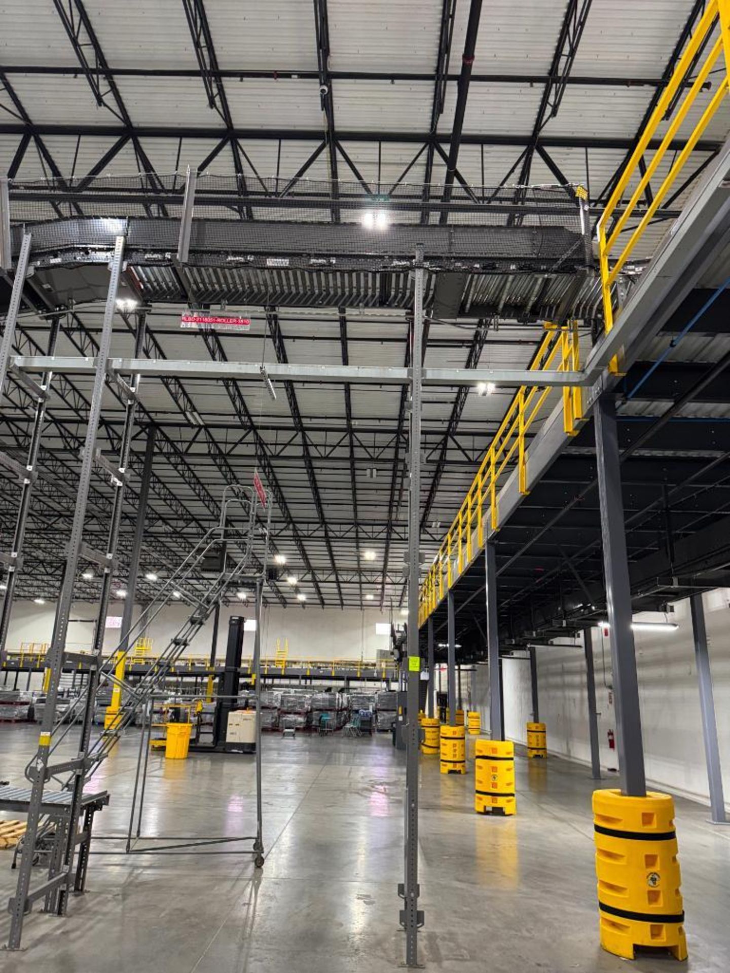 Invata partially powered roller conveyor, on ~16' uprights - Image 2 of 3