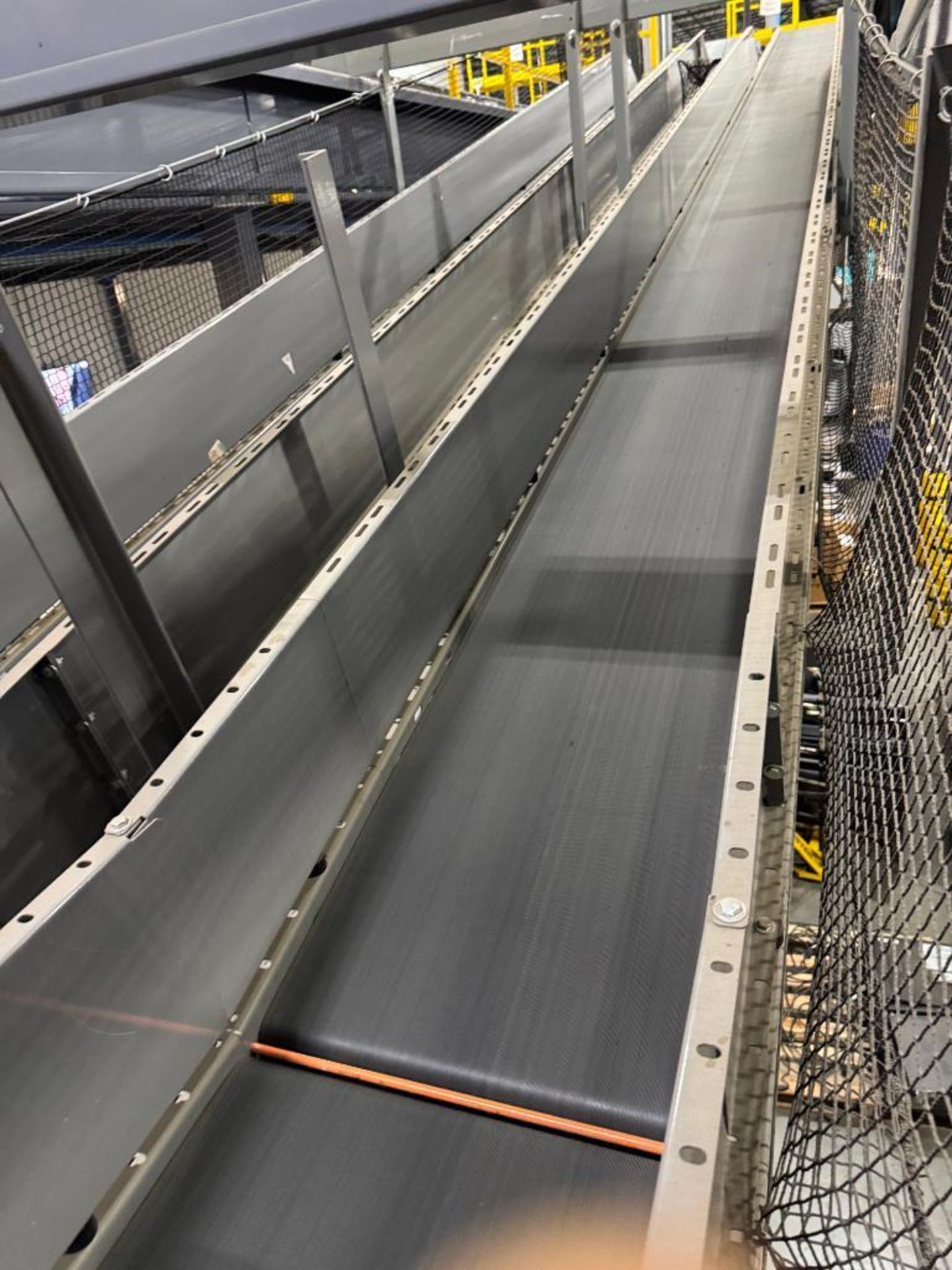 Invata conveyor belt w/ incline