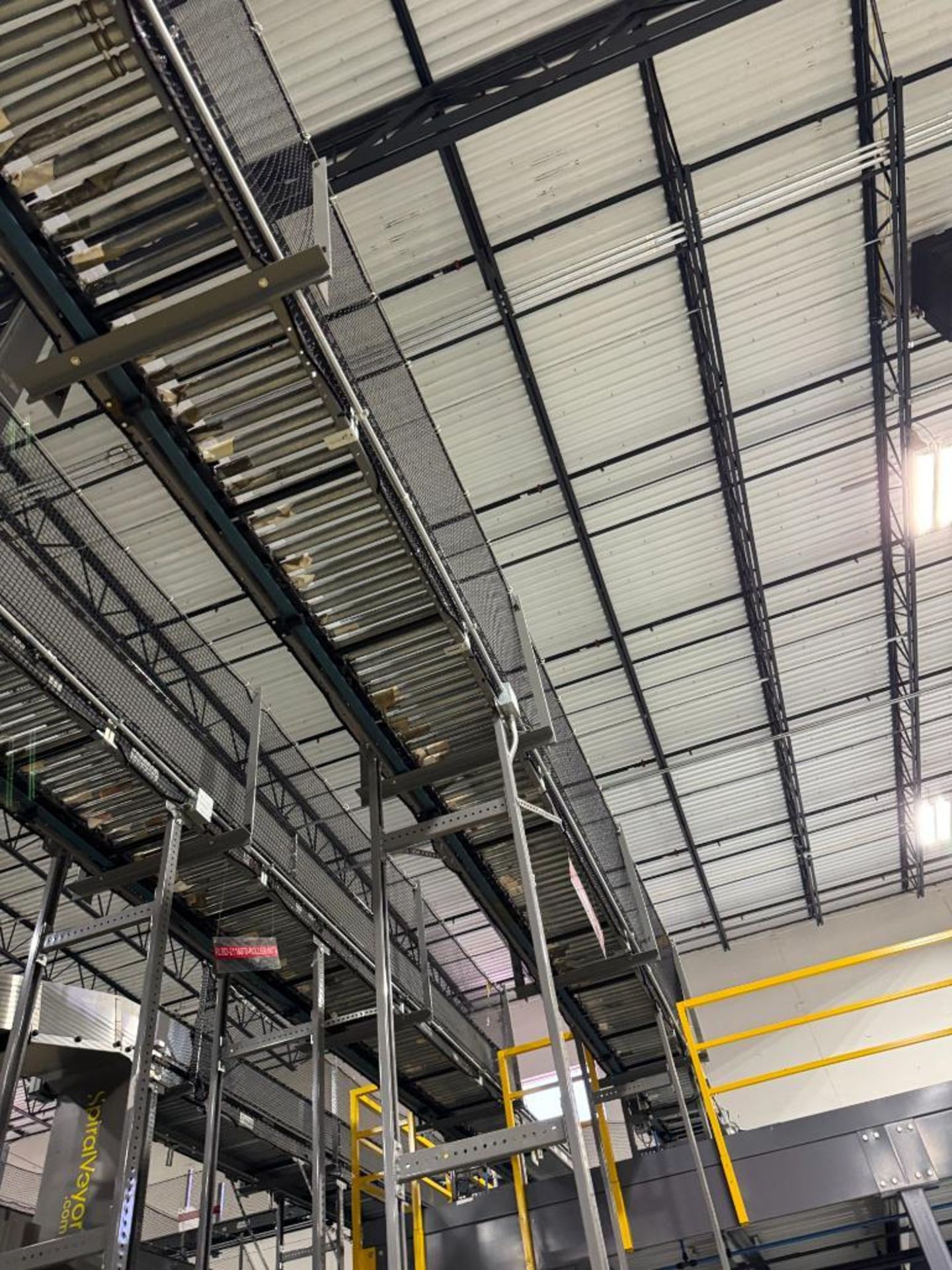 Invata partially powered roller conveyor, on ~16' uprights - Image 2 of 4
