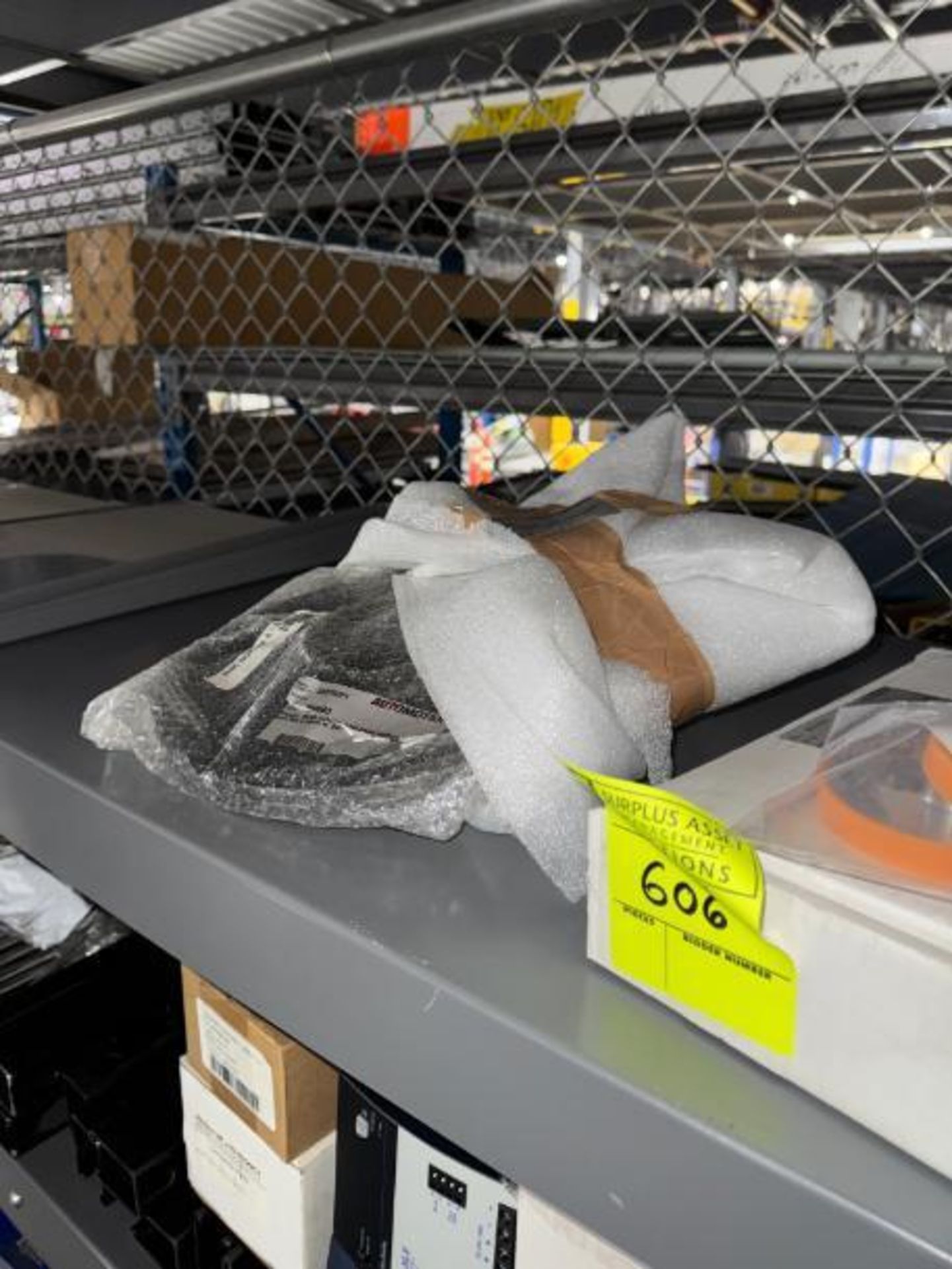 contents of top shelf- Automotion pulley, Photocraft encoder, etc - Image 2 of 3