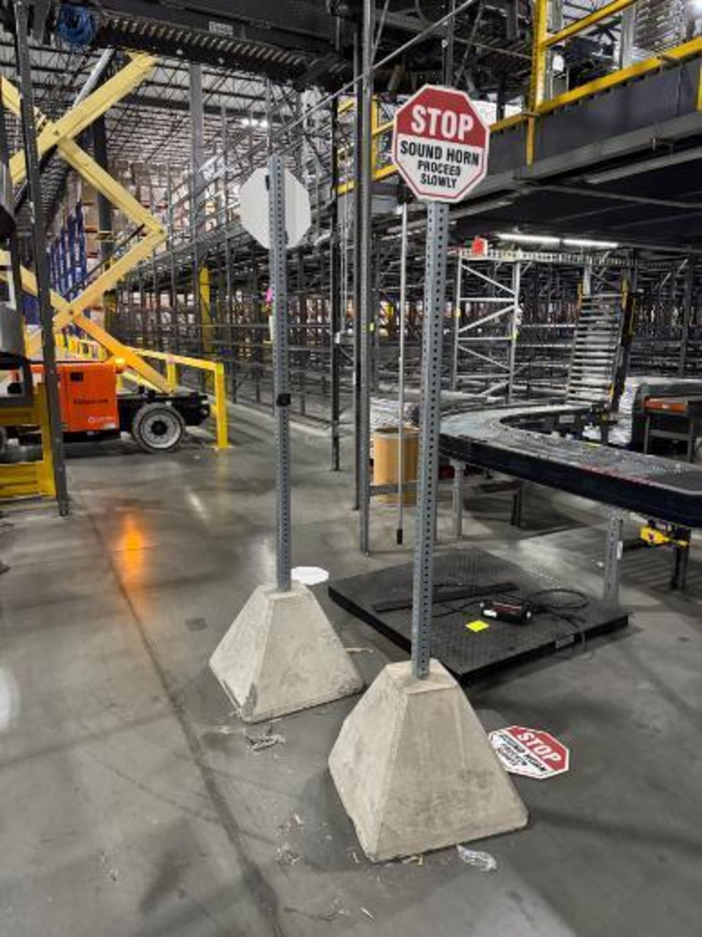 sign stanchions w/ concrete bases - Image 2 of 2