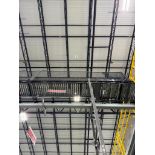 Invata partially powered roller conveyor, on ~16' uprights