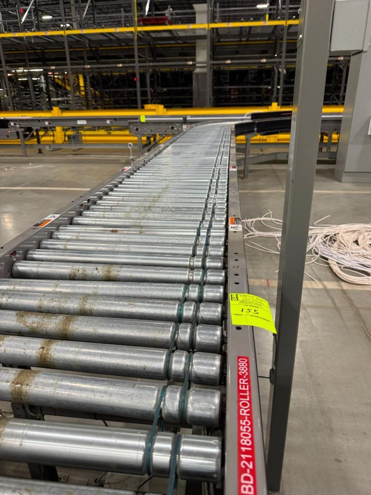 Invata partially powered roller conveyor w/ merger
