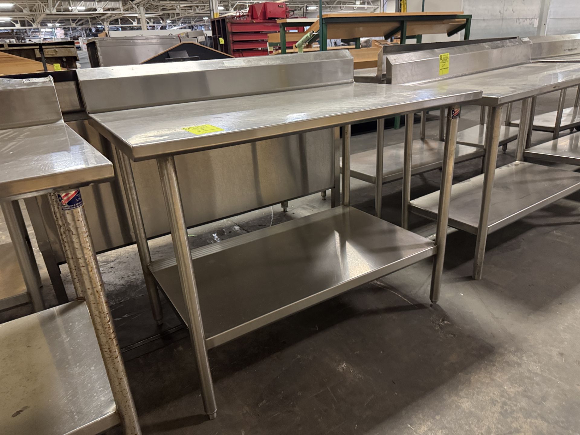 Stainless Steel table w/ undershelf & backsplash