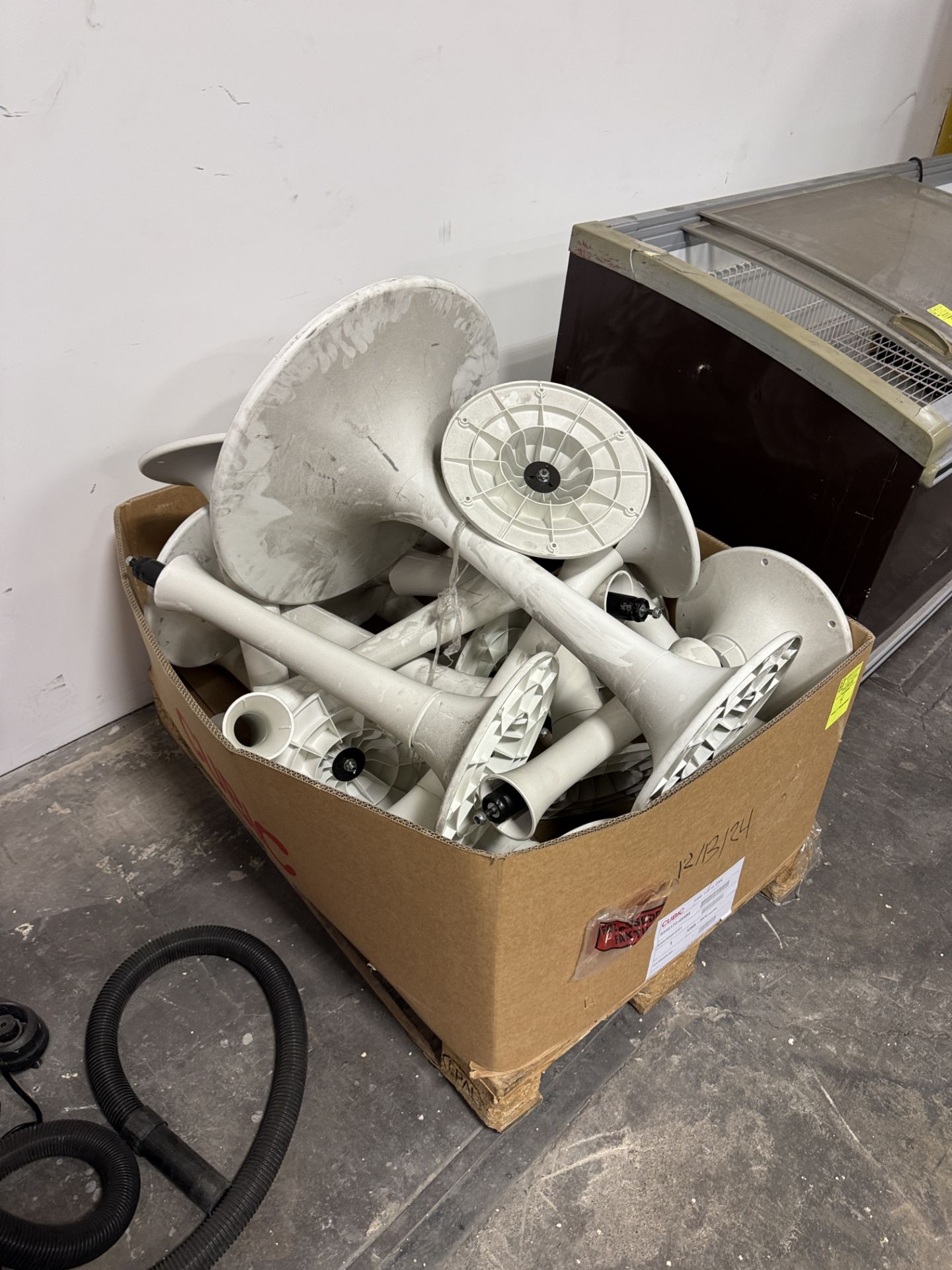 Pallet of metal table bases w/ plastic covering (no tops)
