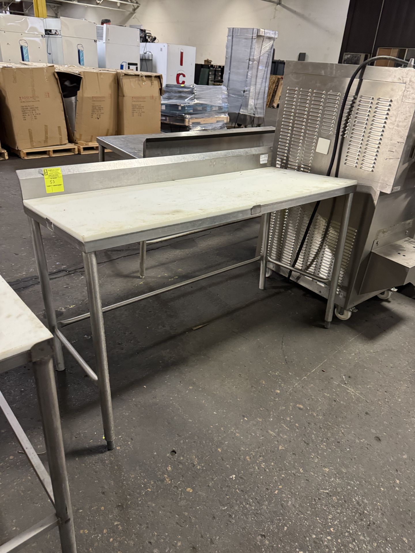 Stainless Steel table w/ polly top & backsplash