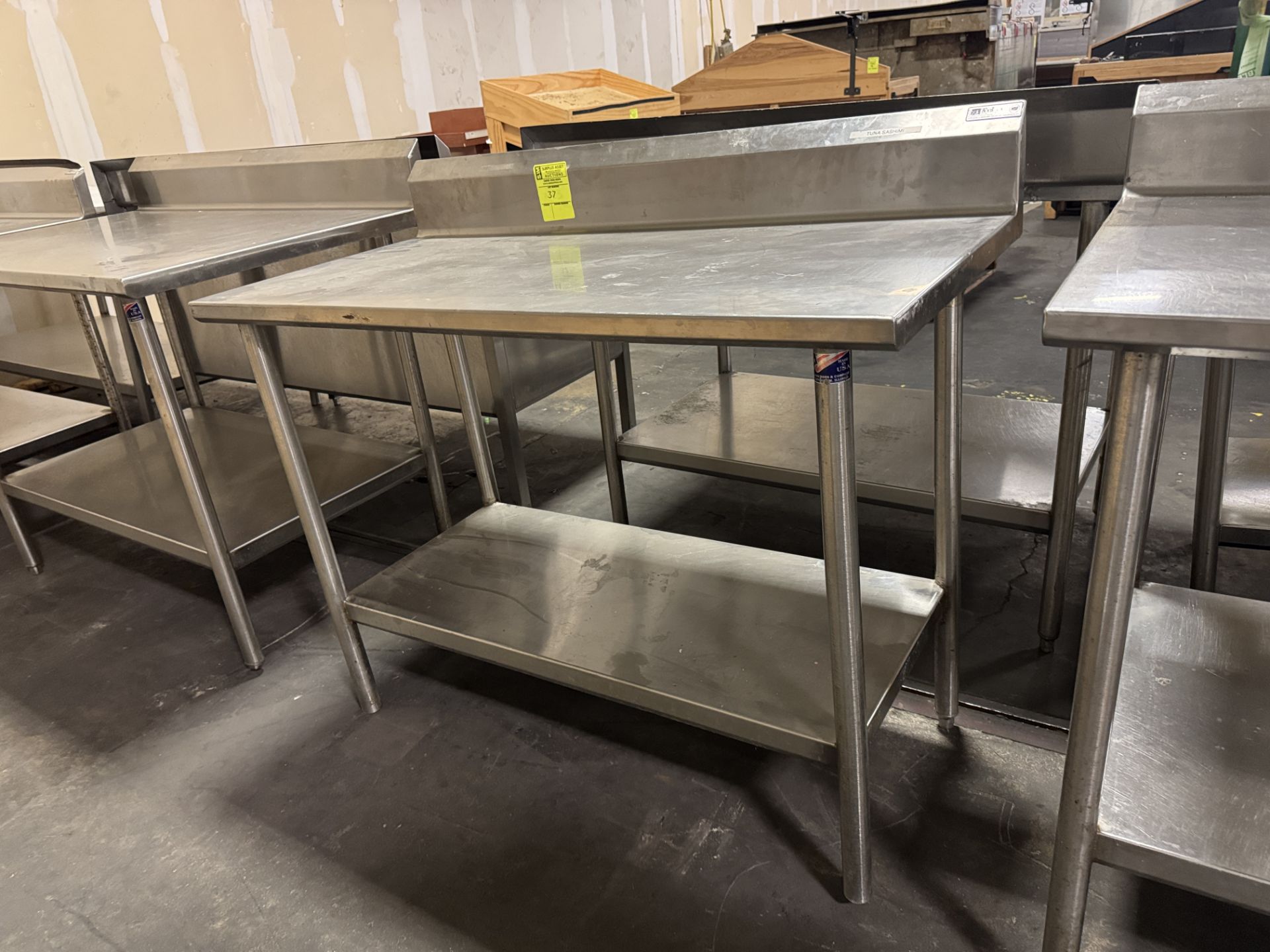 Stainless Steel table w/ undershelf & backsplash