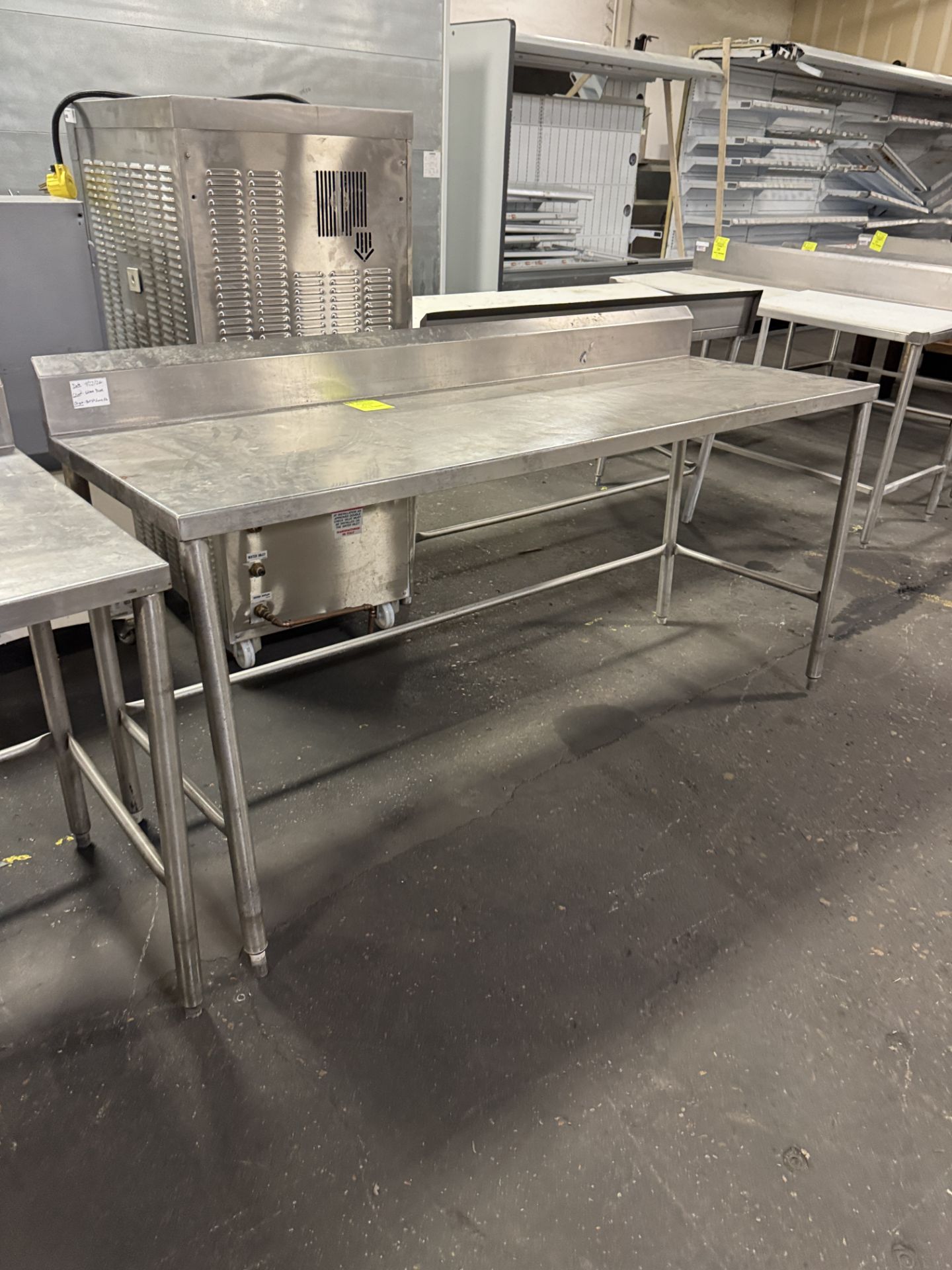 Stainless Steel table w/ backsplash