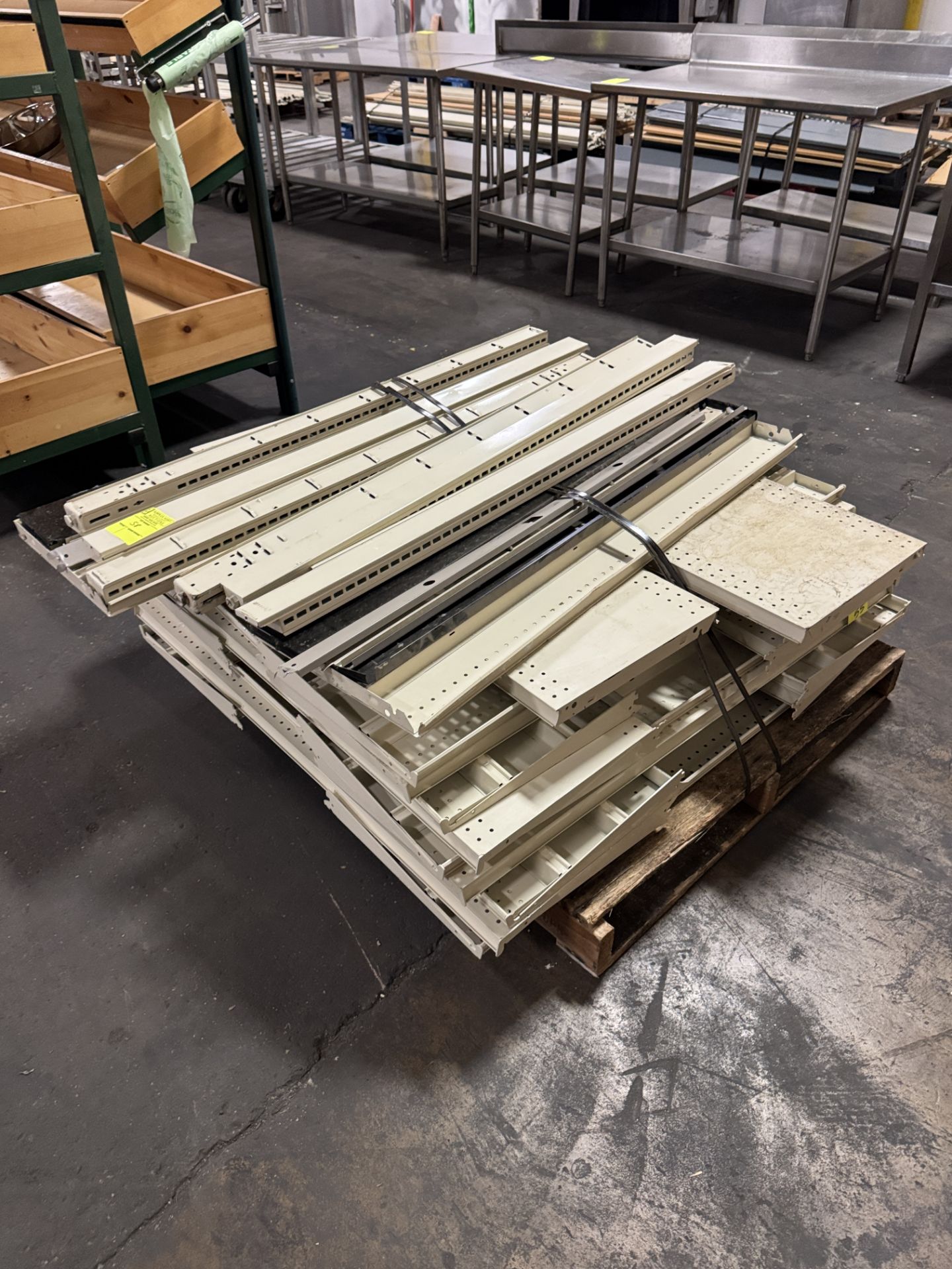 Pallet of Lozier shelving parts, uprights and shelves