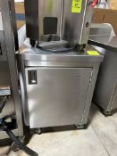 WIN HOLT STAINLESS TABLE ON CASTERS W/ BACKSPLASH AND STORAGE