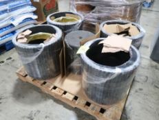 pallet of handcrafted clay planters