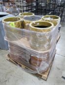 pallet of handcrafted clay planters
