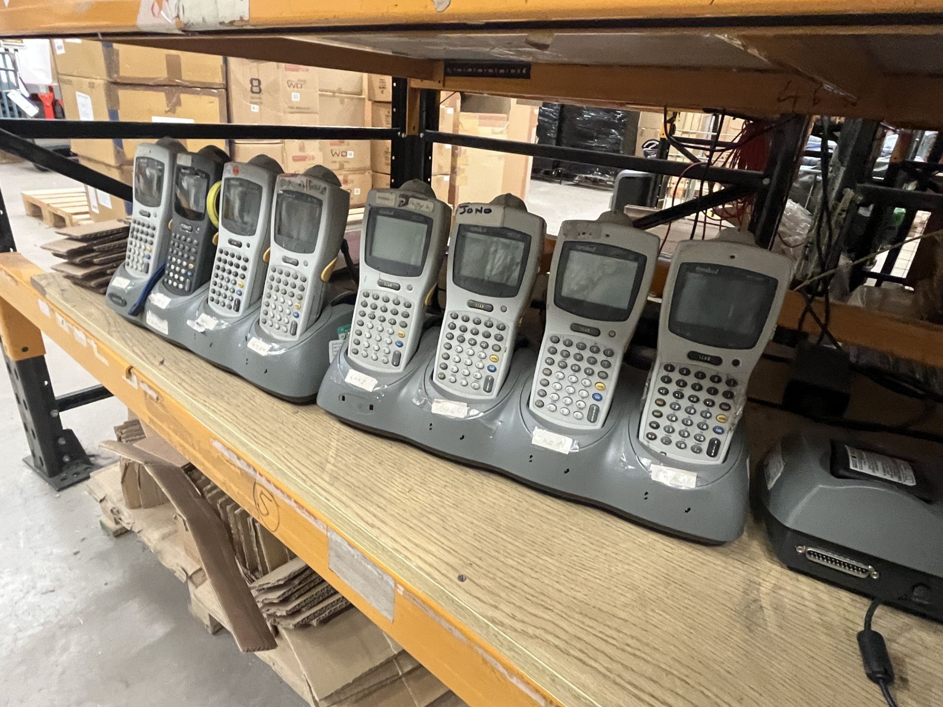 11 Symbol PDT 6100 Scanners, with three charging stations Please read the following important