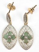 Ohrringe im Art-Deco Stil, 925er Silber, vergoldet und rhodiniert, besetzt mit je 4 Smaragden und j
