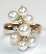 Perl-Brillant-Ring, 585er GG, besetzt mit 7 Perlen und 4 Brillanten von zus. ca. 0,08 ct., Ges.-Gew