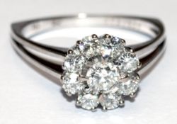 Brillant-Ring, 750er WG, ausgefasst mit 9 Brillanten von zus. ca. 0,86 ct., VS-Si, Ges.-Gew. 5,03 g