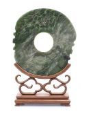 Large Bi-disc in a wooden stand, China, Republic period or earlier