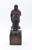 Standing figure of a monk, East Asia, 18th/19th century