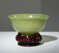 Jade bowl on a wooden base, China