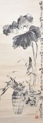 Lotus as a potted plant beside a flower vase, China, early 20th century