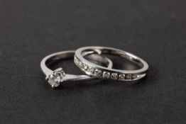 Pair of platinum rings, 20th century.