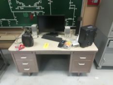 Metal desk with contents