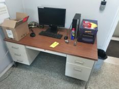 Metal desk with contents