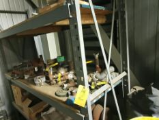 Metal shelf with misc pipe fitting and content