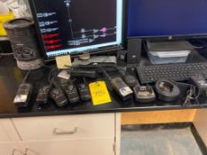 LOT OF 7 hand held walkie talkie radio with charging base