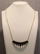 Granatcollier in 8 Karat Gelbgold