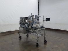 Wild Goose 6 Head In-Line Liquid Filler with Single Head Seamer