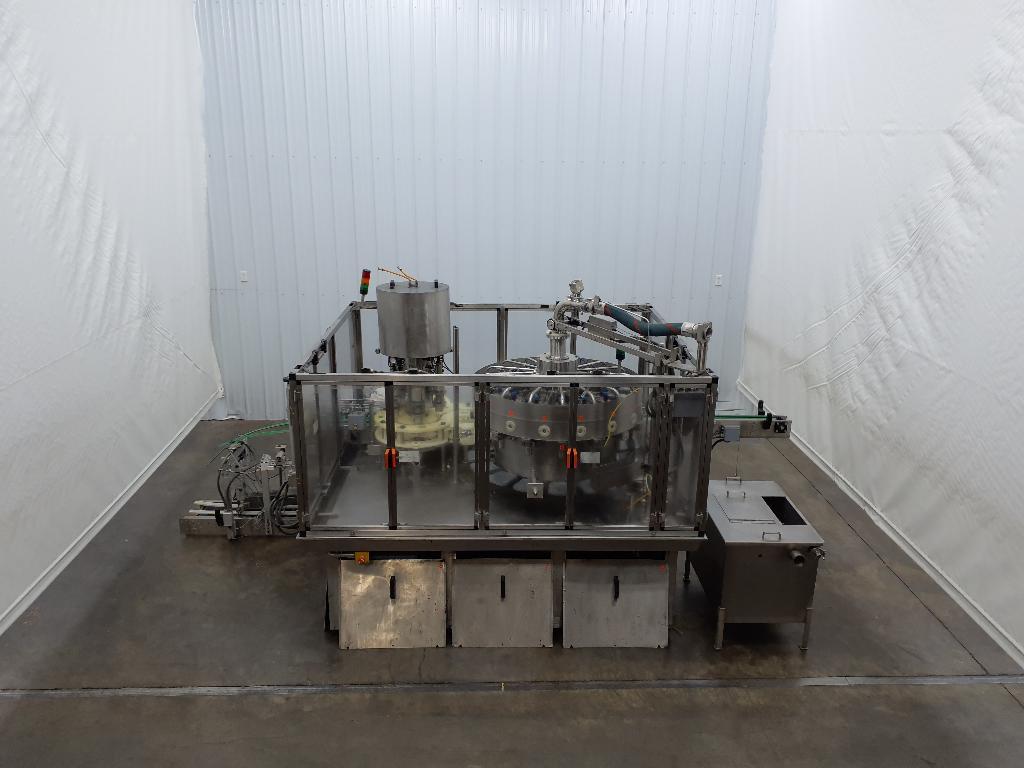 Ronchi Exacta/R Monobloc 16 Head Magnetic Flow Meter Net Weight Filler And 5 Head Capper