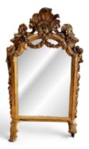 British, 18th century, A carved and gilded dresser mirror