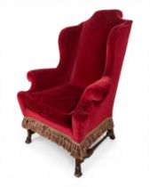 A William & Mary style walnut wing back armchair
