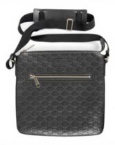 Gucci, A black leather cross body bag