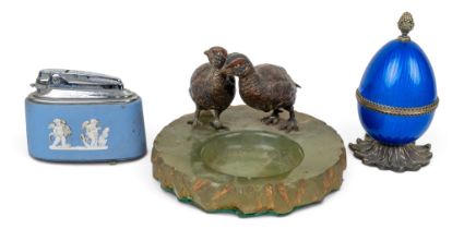 Two table lighters together with an onyx ashtray