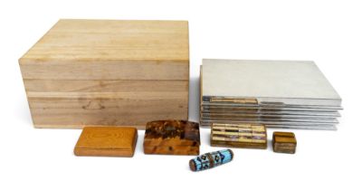 A group of snuff boxes, cigarette case, and a pill box, together with a thimble