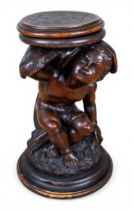 A North Italian carved walnut piano stool, Venetian, late 19th century