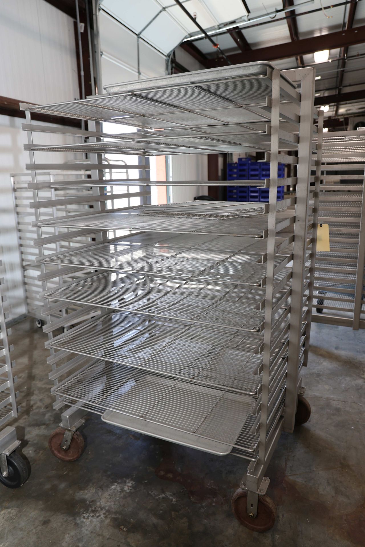 Rolling speed rack with 18 double sided shelves, height 6', width 45 ...