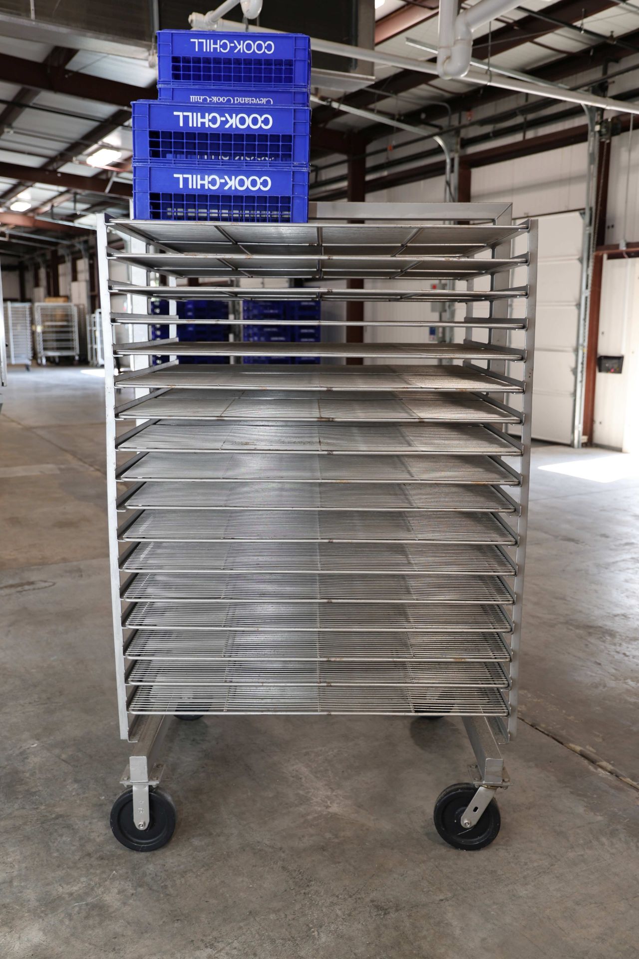 Rolling speed rack with 18 double sided shelves, height 6', width 45 ...